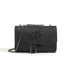 Bolso bandolera efecto coco con cadena metálica