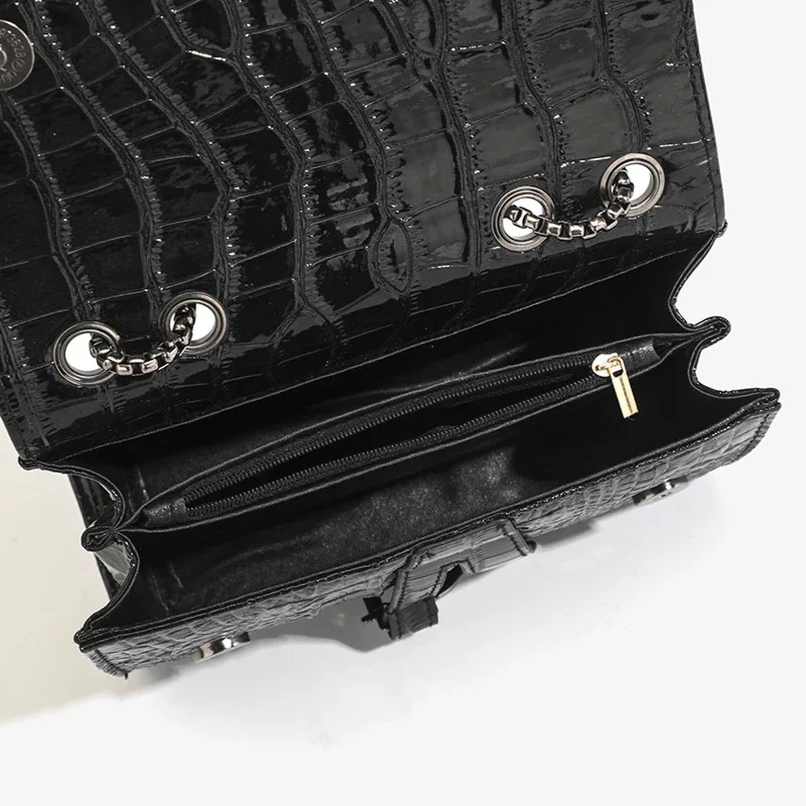 Bolso bandolera efecto coco · cadena ajustable hasta 105 cm