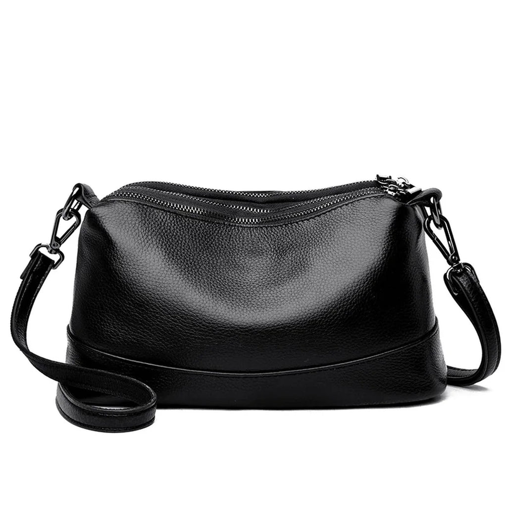 Bolso bandolera de piel vacuna · 3 compartimentos con cremallera