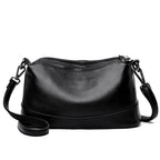 Bolso bandolera de piel vacuna · 3 compartimentos con cremallera