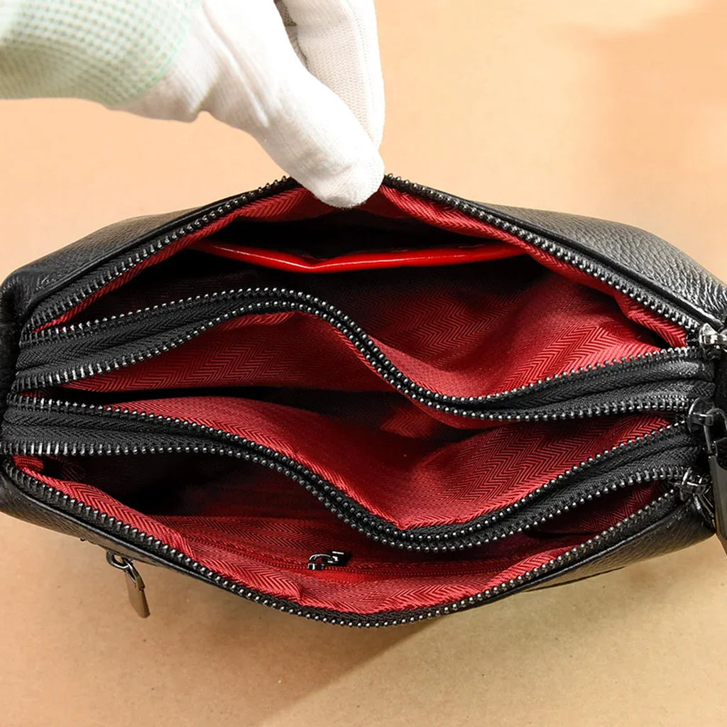 Bolso bandolera de piel vacuna · 3 compartimentos con cremallera