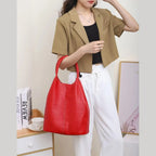 Bolso saco de piel de vacuno de flor entera · bolsa interior extraíble