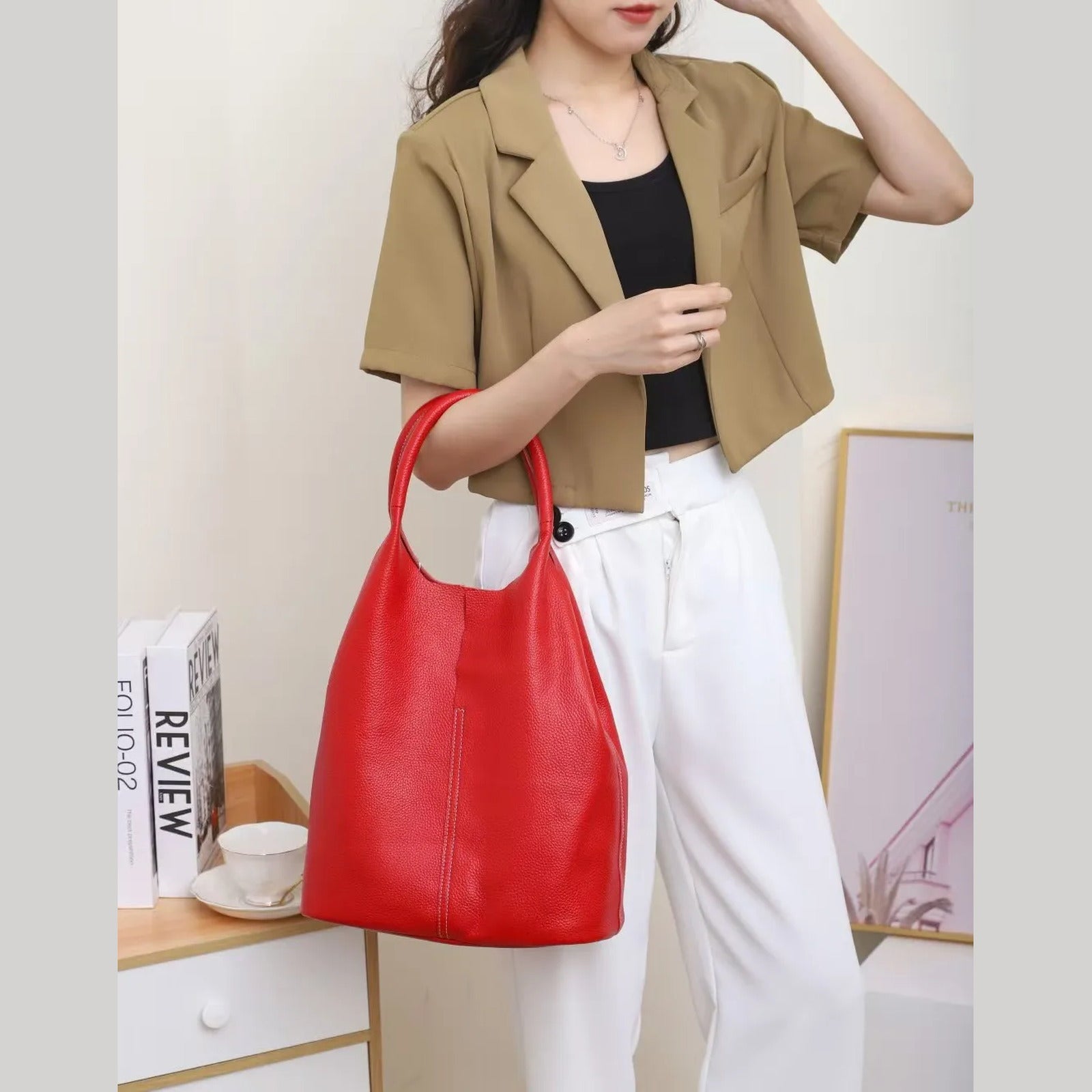 Bolso saco de piel de vacuno de flor entera · bolsa interior extraíble