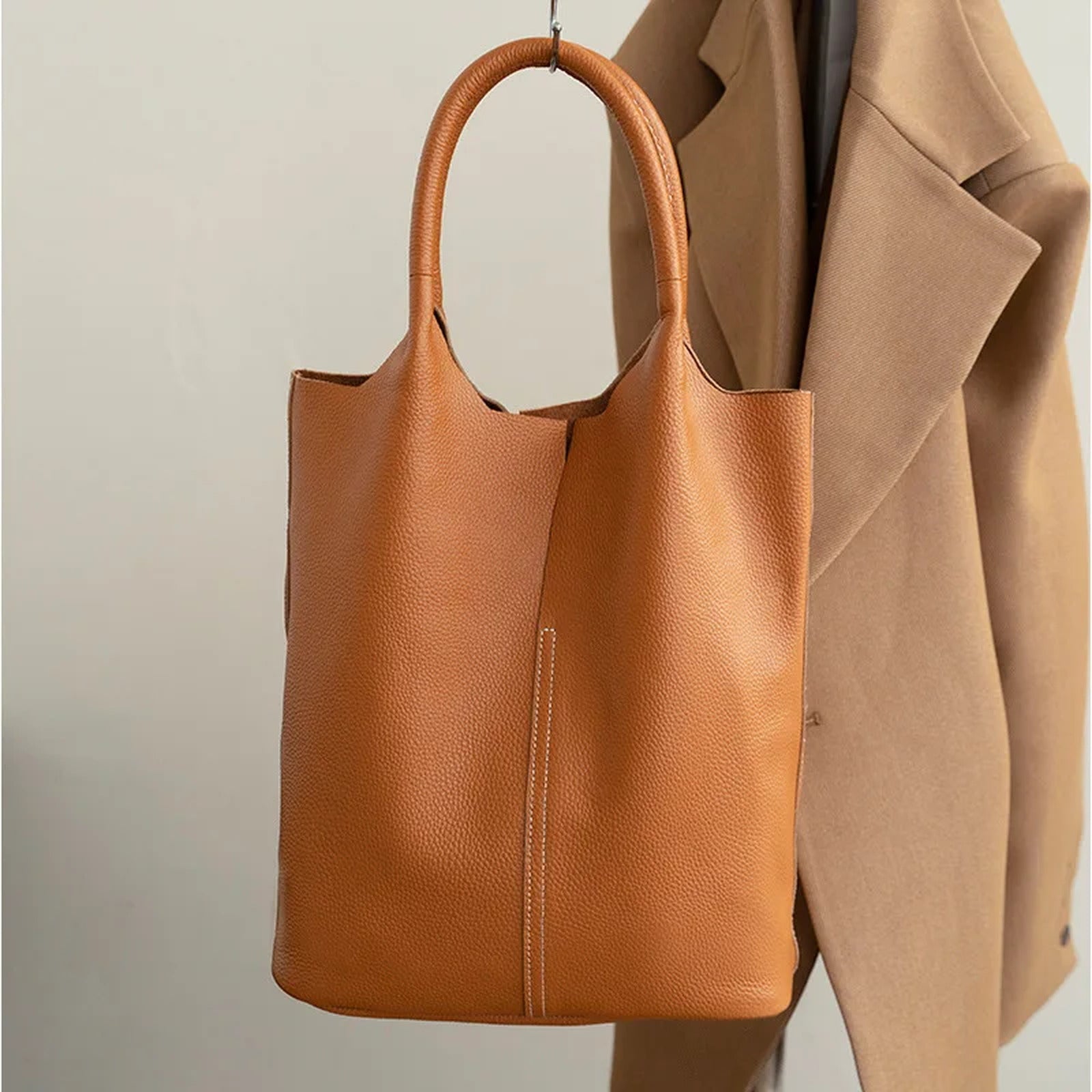 Bolso saco de piel de vacuno de flor entera · bolsa interior extraíble