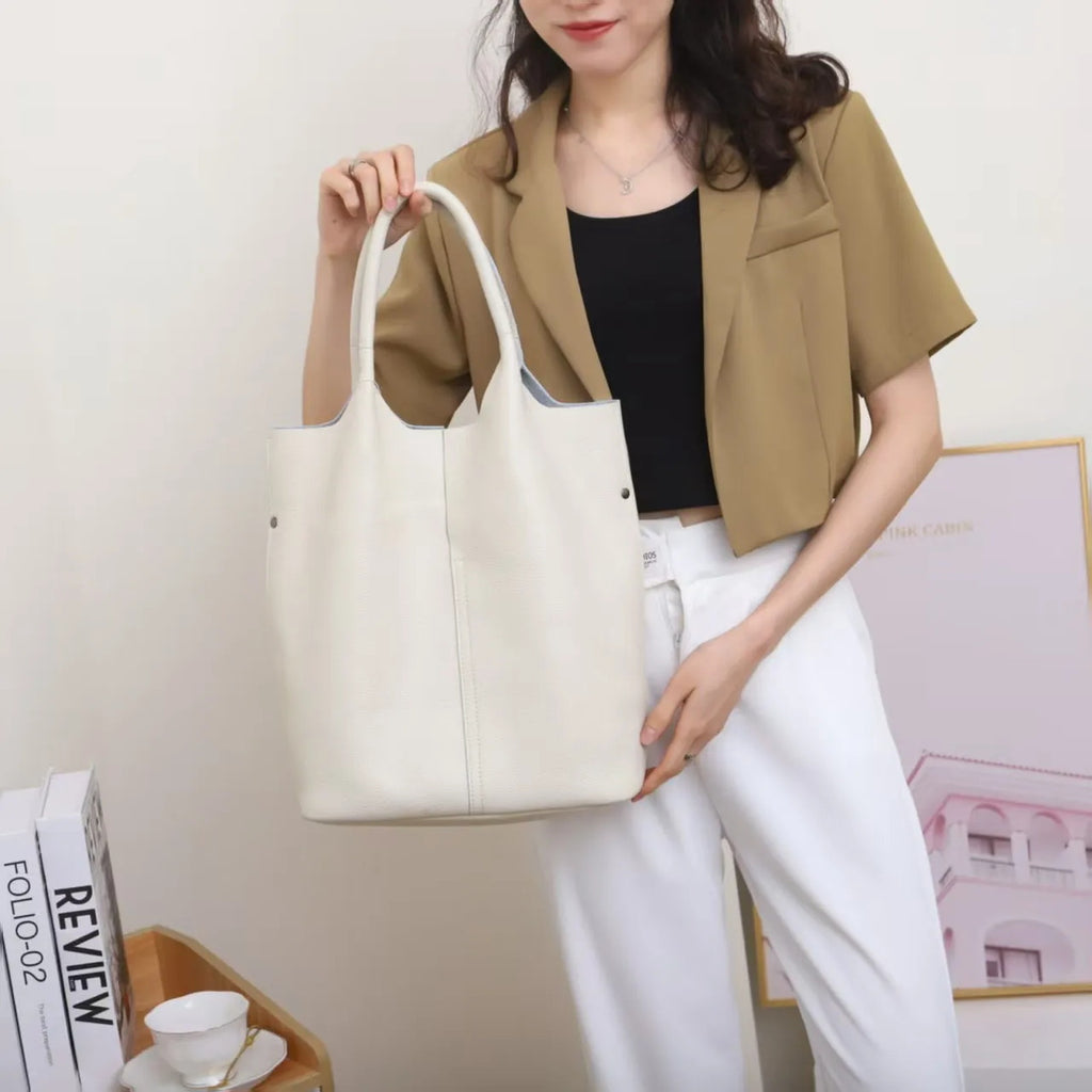 Bolso saco de piel de vacuno de flor entera · bolsa interior extraíble