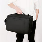 Mochila expansible de 20 a 35 L · puerto USB y funda para portátil